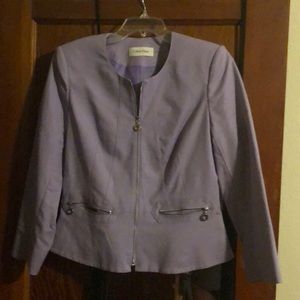 Calvin Klein size 8 zip up jacket with pockets.